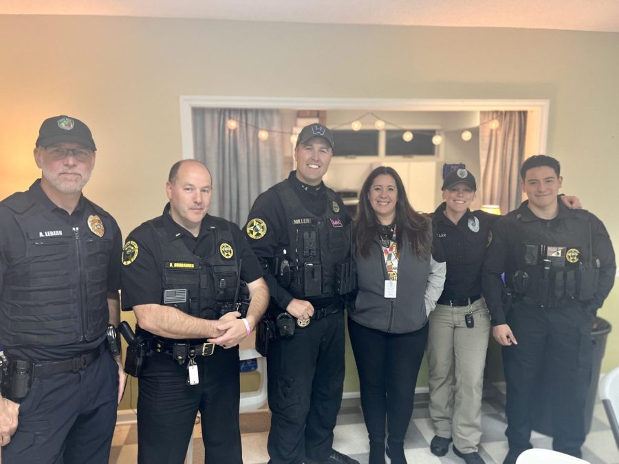 Pictured left to right are Chief of Police Andy Le Beau, Lieutenant Brian Bumgarner, Sergeant Casey Miller, Yolanda Adams, Officer Kat Eller, and Officer Derrick Zamora who pose for a picture, Oct. 25, 2022.