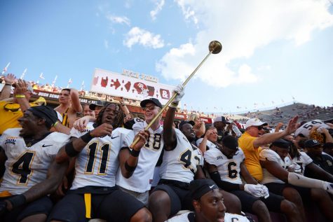 Several Mountaineers celebrate their historic victory over No. 6 Texas A&M Sept. 10, 2022. 