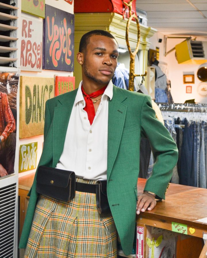 Miles Cole, a senior apparel design major, pictured at Anna Banana’s Fine Consignment on King Street.