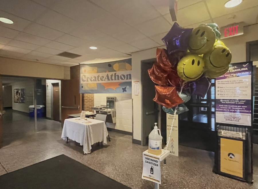 The entrance of Walker Hall displaying the CreateAthon banner and balloons.