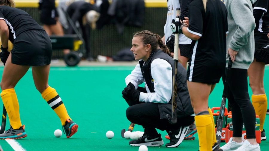 Former App State head coach Meghan Dawson coaches her team from the sidelines. 