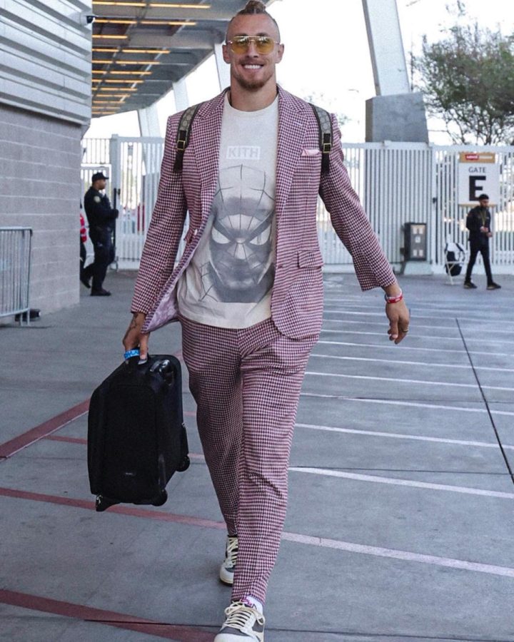 George+Kittle%2C+tight+end+for+the+San+Francisco+49ers%2C+wearing+a+suit+designed+by+Mitch+Purgason+before+San+Francisco%E2%80%99s+home+game+vs.+the+Los+Angeles+Rams+Oct.+3%2C+2022.+