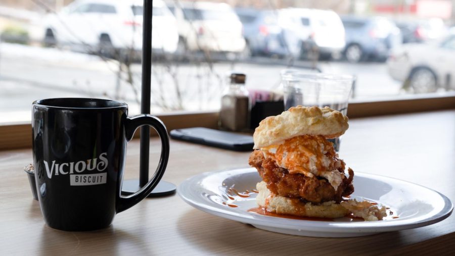 Vicious Biscuit’s Fat Boy is a popular order, a cheese-filled biscuit covered in hot sauce with spicy fried chicken and pimento cheese in between.
