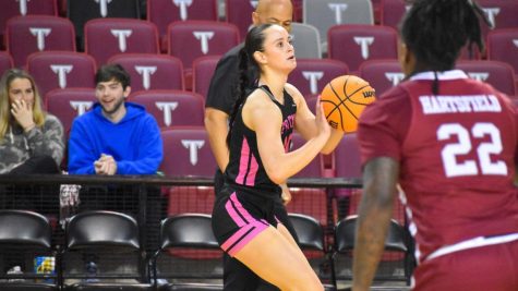 Sophomore guard Emily Carver pulls up from long range against Troy Feb. 18, 2023. 