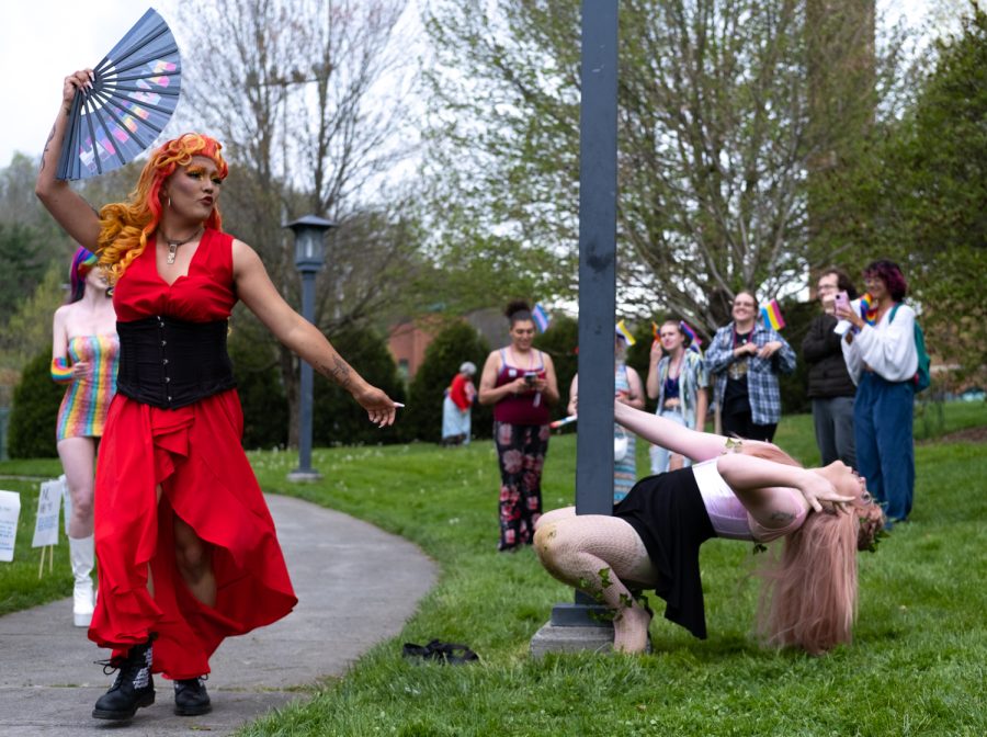Performances Tea Critchfield and Addison Aubrey dance together at Durham Part, while whistles and cheers ensue from the audience, Friday, April 14, 2023.