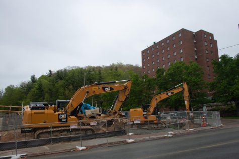 Justice Hall being torn down in May 2021 with Coltrane Hall looming nehind. Coltrane, Justice and Garner were replaced by New River Hall.