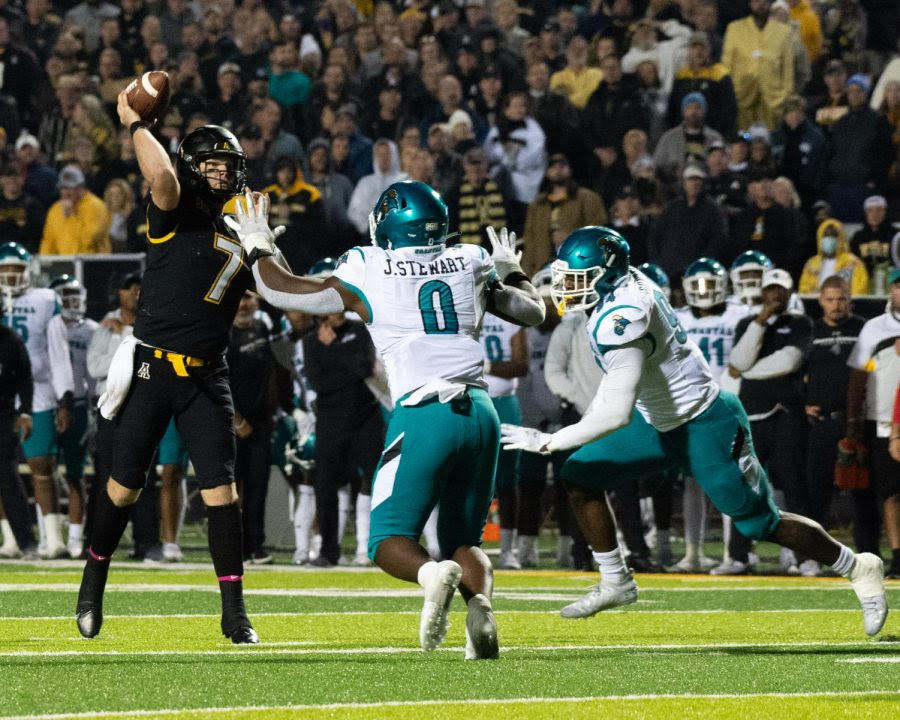Graduate transfer quarterback Chase Brice lets the ball fly with two Chanticleers in his face. Brice posted 347 passing yards and two touchdowns against a defense only giving up 15 points per game.