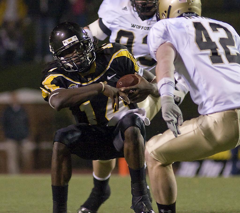 Former App State quarterback Armanti Edwards avoids the pass rush against Wofford Nov. 1, 2008.