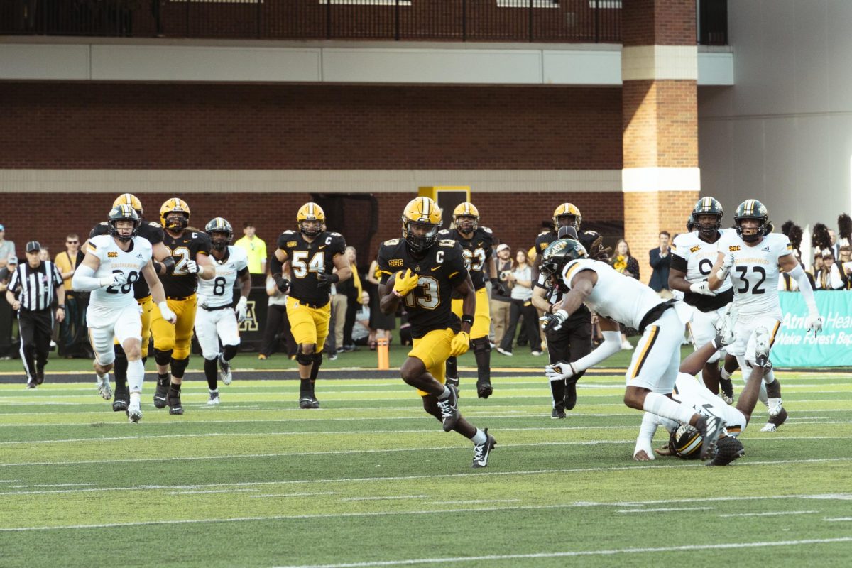 Junior wide receiver Christan Horn avoids the Southern Miss defense Oct. 28. Horn finished the game with eight catches for 165 receiving yards and two touchdowns.