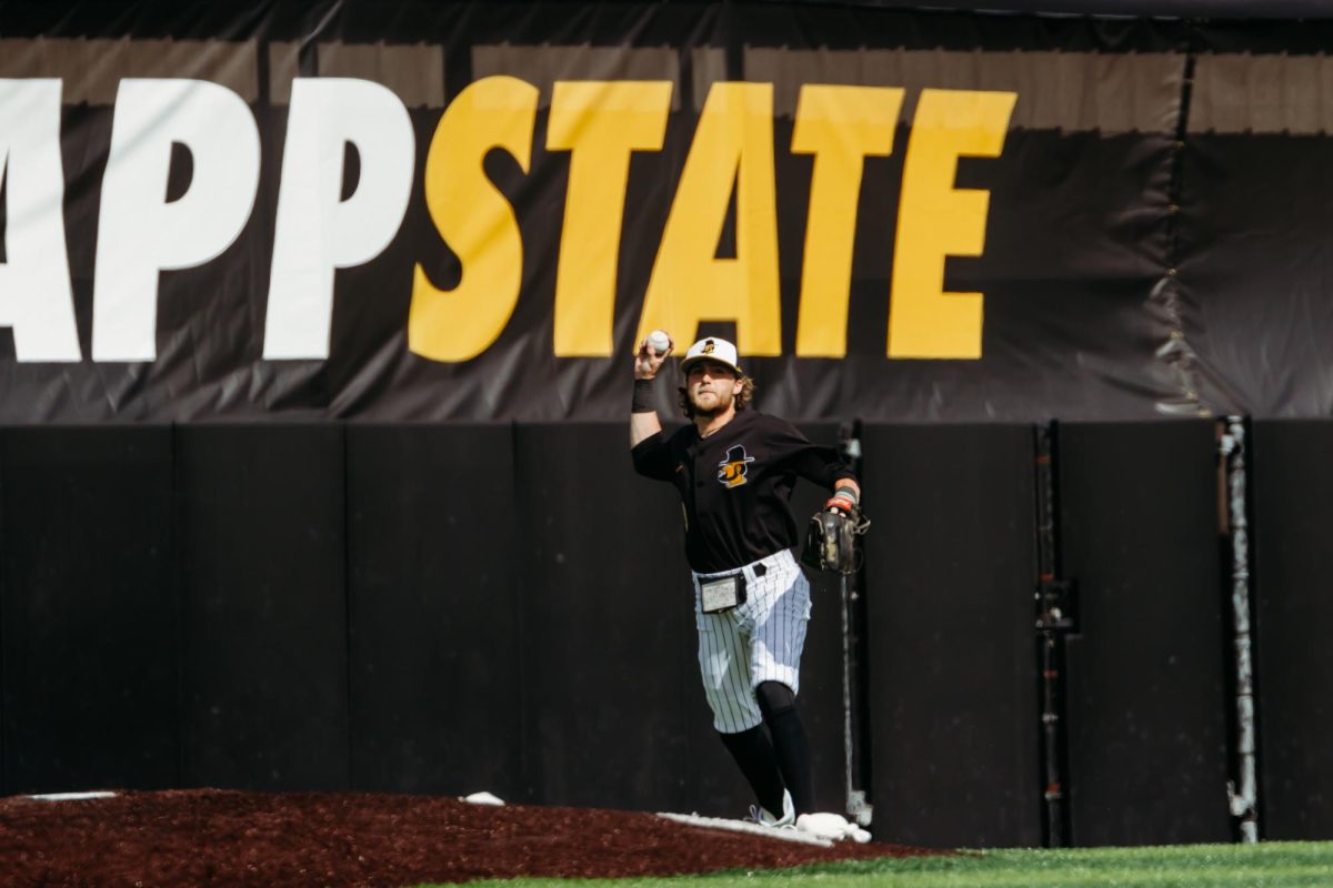 Former App State utility player Andrew Terrell throws a ball back into play against Georgia State March 25, 2023.