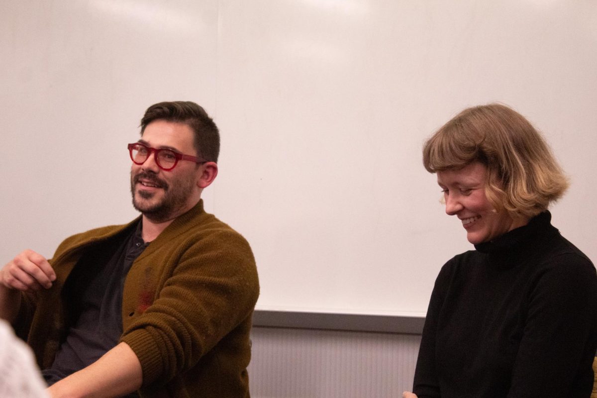  Professors Matthew Wimbley and Ashleigh Bryant-Williams laugh while thinking of answers to give the audience. Appalachian State Writer Series, Nov. 9 2023.
