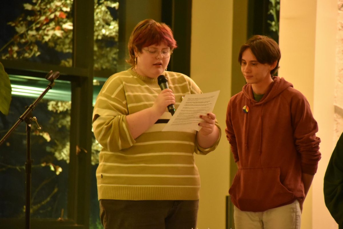 Senior Nathan Asher was the main coordinator of the Transgender Day of Remembrance candlelight vigil. Asher and other speakers read off the names of some of the transgender people we have lost this year to violence and transphobia.