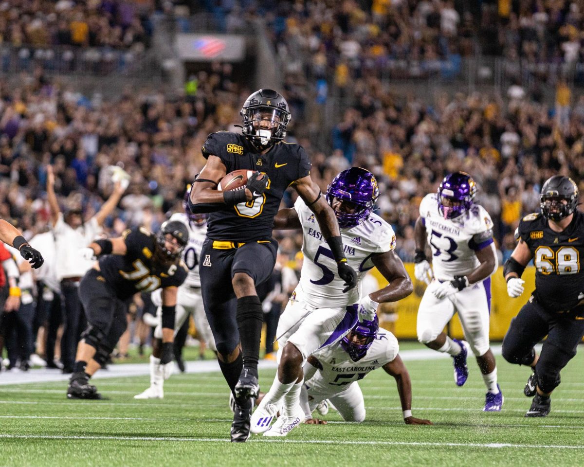 Former App State running back Cam Peoples takes it to the house against East Carolina Sept. 2, 2021. The Mountaineers will make their return to Bank of America Stadium in 2025.