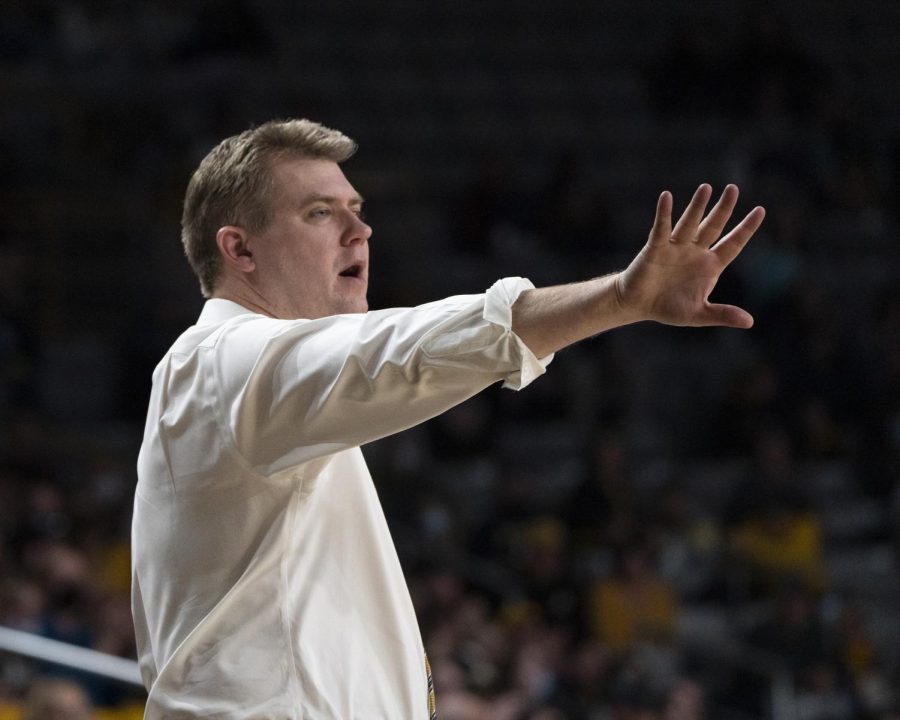 Men’s basketball head coach Dustin Kerns calls out to his team in a game versus Georgia State Feb. 12, 2022. 