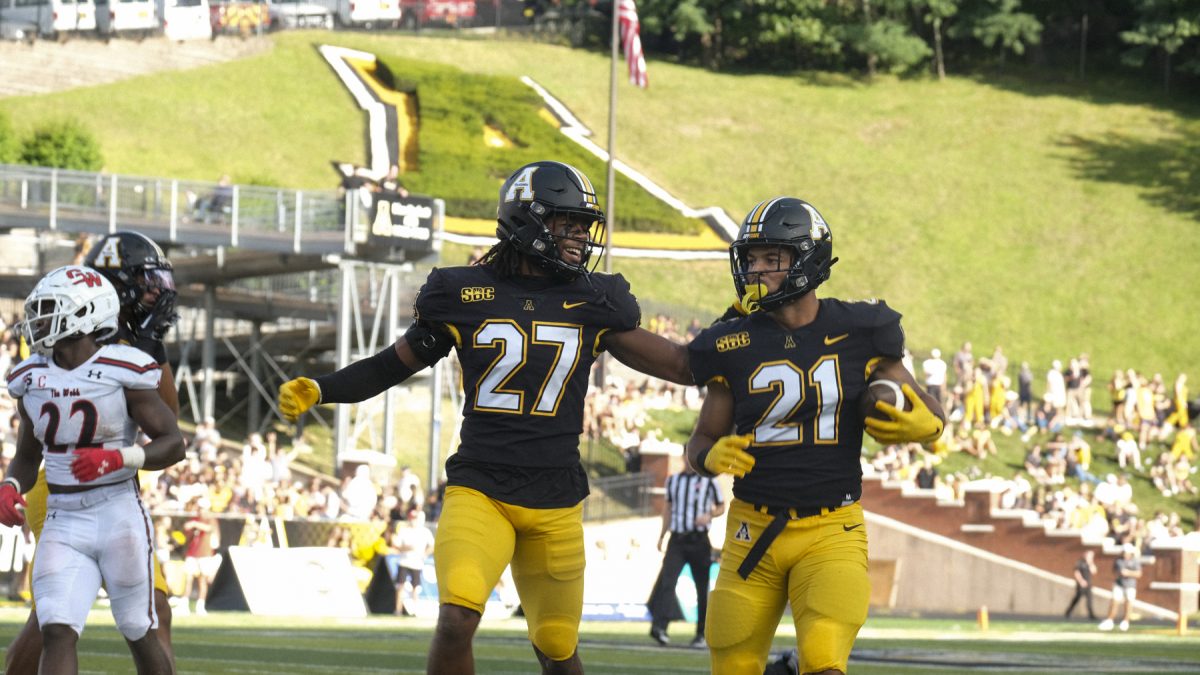 DJ Burks runs the ball during App State’s season opener against Gardner-Webb on Sept. 2, 2023. Burks had one assisted tackle during the game.