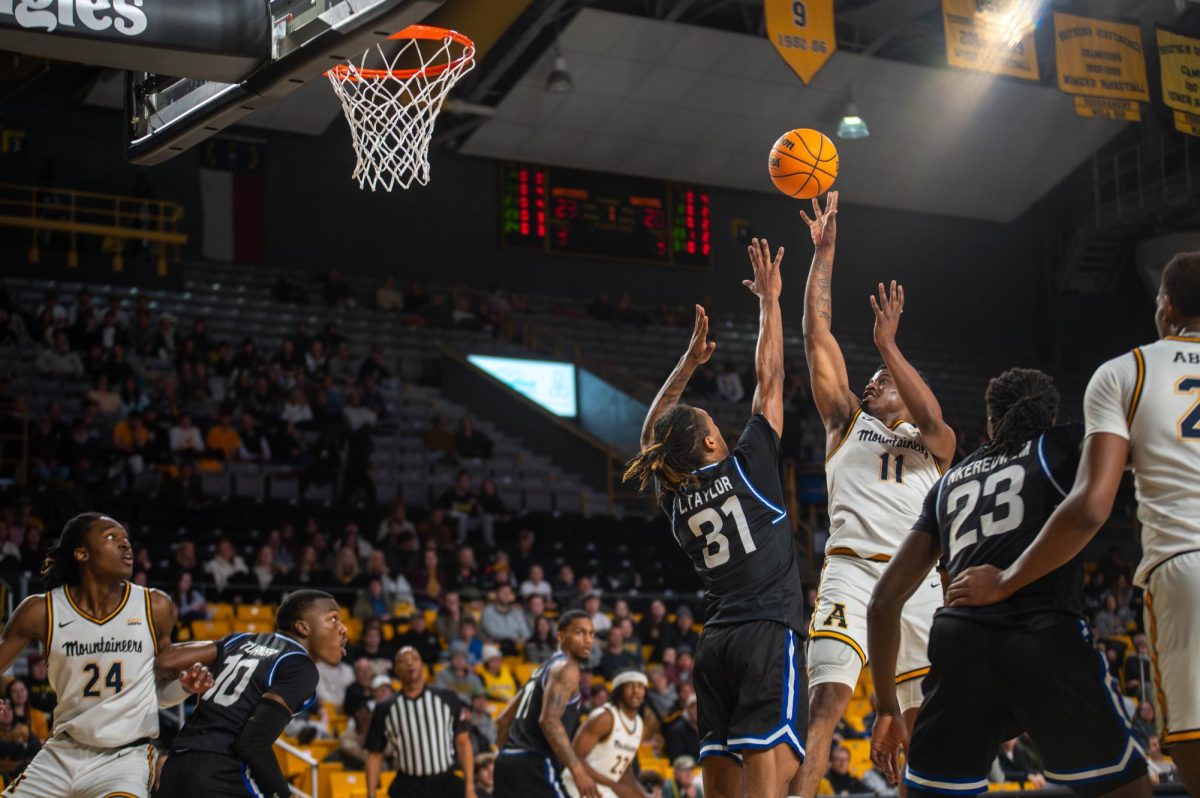 Fifth year senior Donovan Gregory goes up for a layup against the Georgia State defense. Gregory had 11 points and 4 rebounds Jan. 17, 2024.