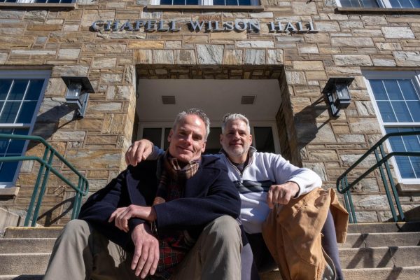 Brad Parquette (right) and Kevin Warner (left), professors in the Department of Theatre and Dance, sit outside Chapel Wilson Hall, where Warner’s office resides Feb. 7, 2024. Parquette’s favorite thing about Warner is attention to detail and ability to truly listen to people when they speak. 
