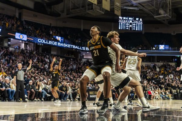 Sophomore forward Justin Abson boxes out a Wake Forest player March 20. Abson entered the transfer portal Monday morning.