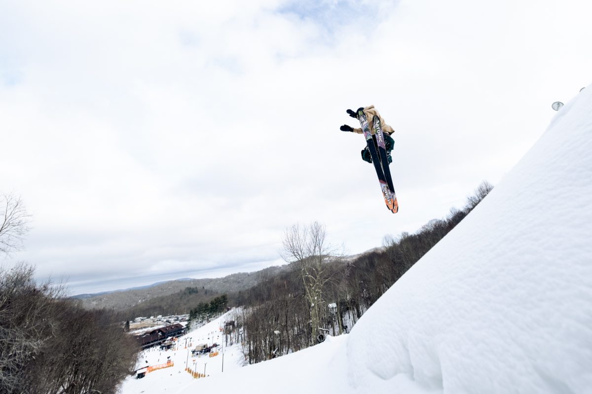 A skier takes a jump off of the top of the Big Appal black diamond route on Jan. 10. Skiing is a unique class offering for any university where students of all abilities can enroll, whether it’s your first day on the mountain or you’ve been on snow your whole life. 