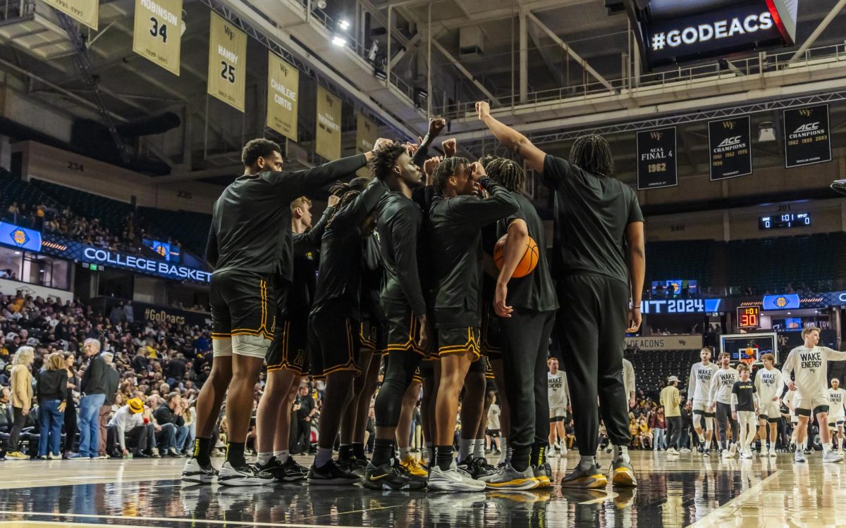 The+Mountaineers+huddle+up+prior+to+their+matchup+against+Wake+Forest+March+20.+App+State+finished+the+2023-24+season+27-7%2C+setting+the+program+record+for+wins+in+a+single+season.