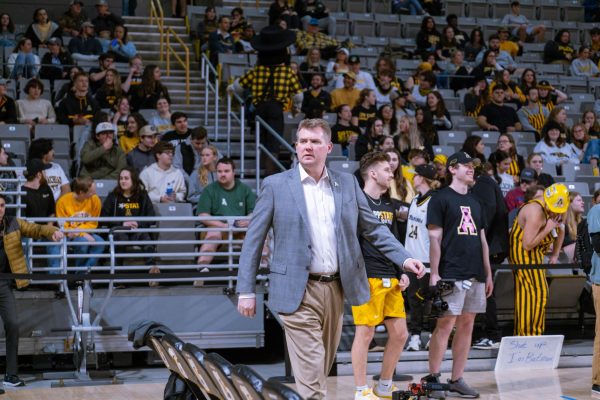 Mens basketball head coach Dustin Kerns walks out onto the court against Old Dominion Feb. 28. Kerns earned the 2024 Sun Belt Coach of the Year honors.