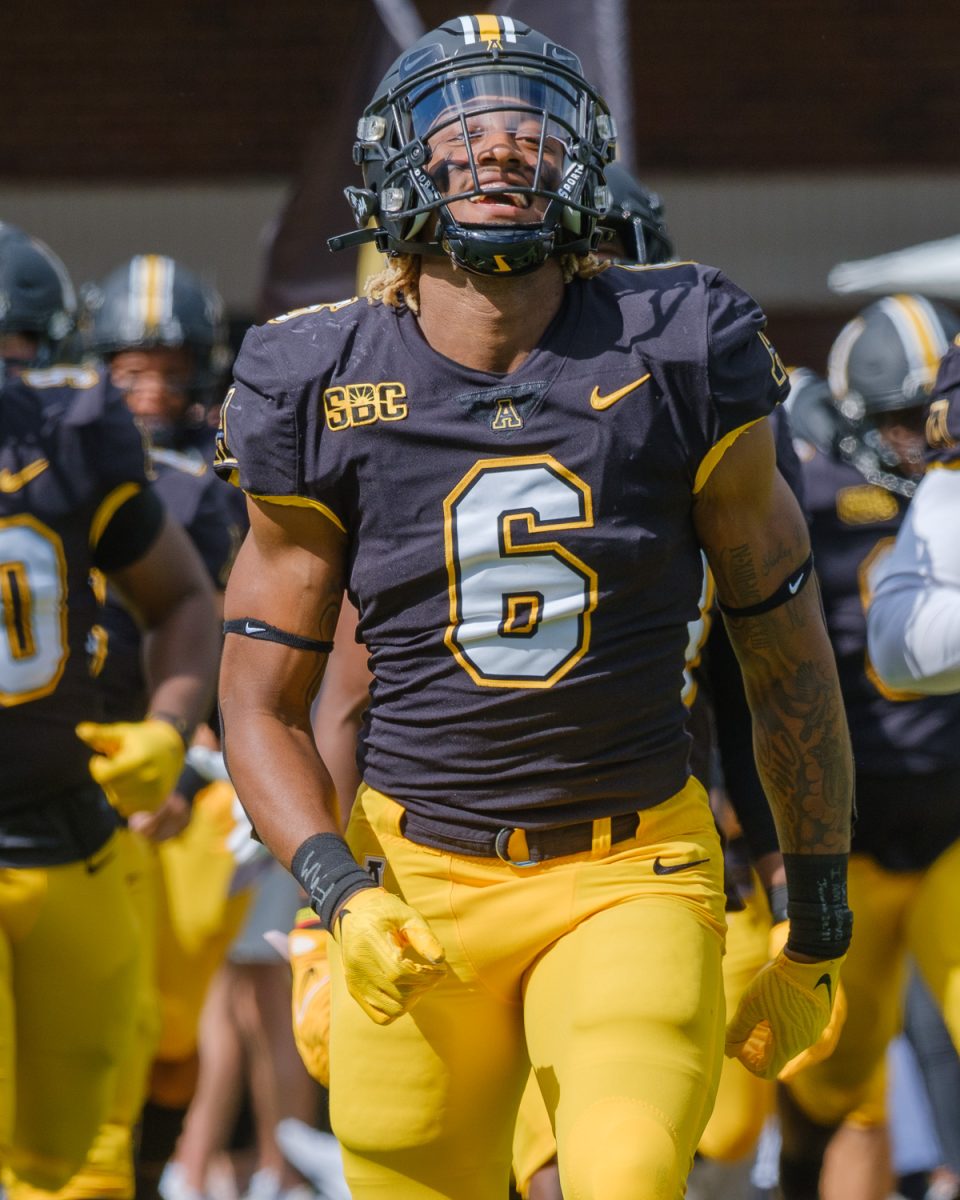 Former Mountaineers running back Cam Peoples walks out onto the field prior to App States matchup against Elon Sept. 18, 2021. Peoples rushed for 80 yards and two touchdowns.