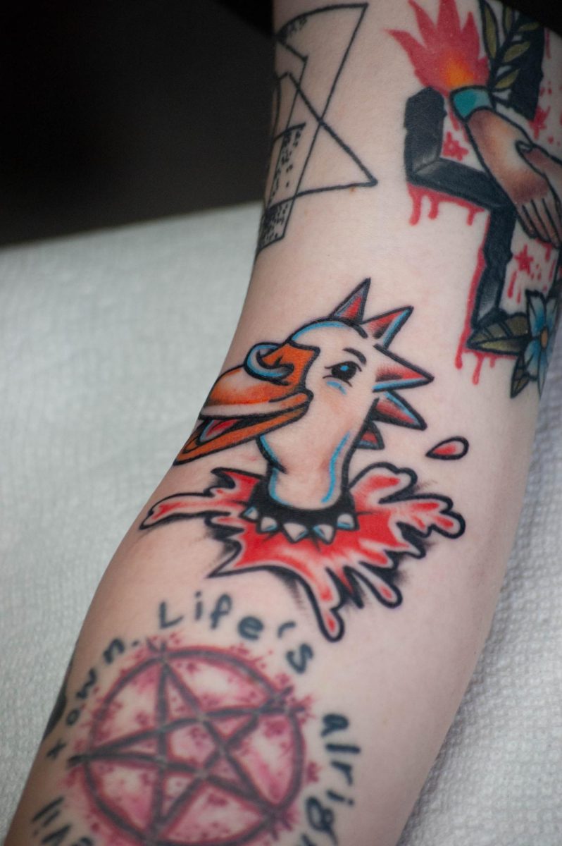 A tattoo of the Bubble Yum duck by Sloan Blinsink on March 7. Blinsink’s style utilizes bright colors and it’s often influenced by pop culture.