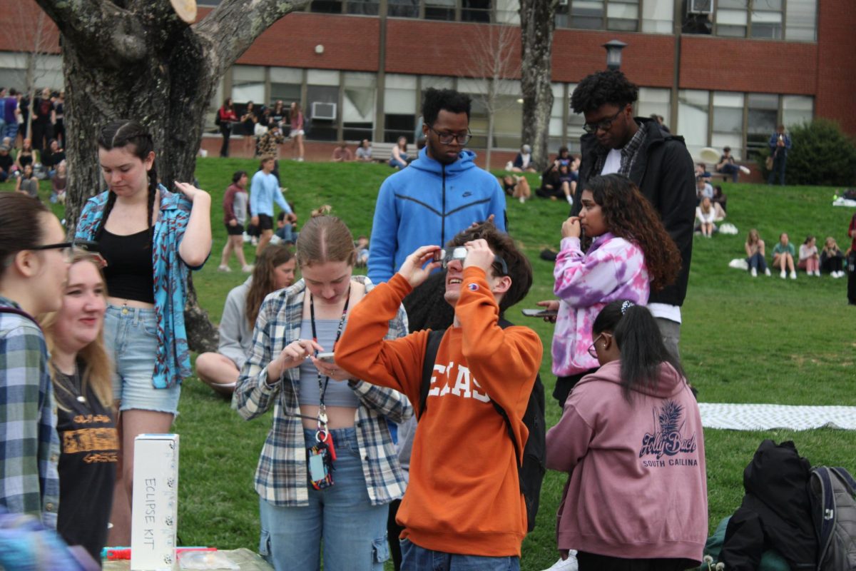 Hundreds of students gathered on Sanford Mall April 8 to watch the solar eclipse. The Physics and Astronomy Club handed out solar eclipse glasses for those wishing to view the eclipse.