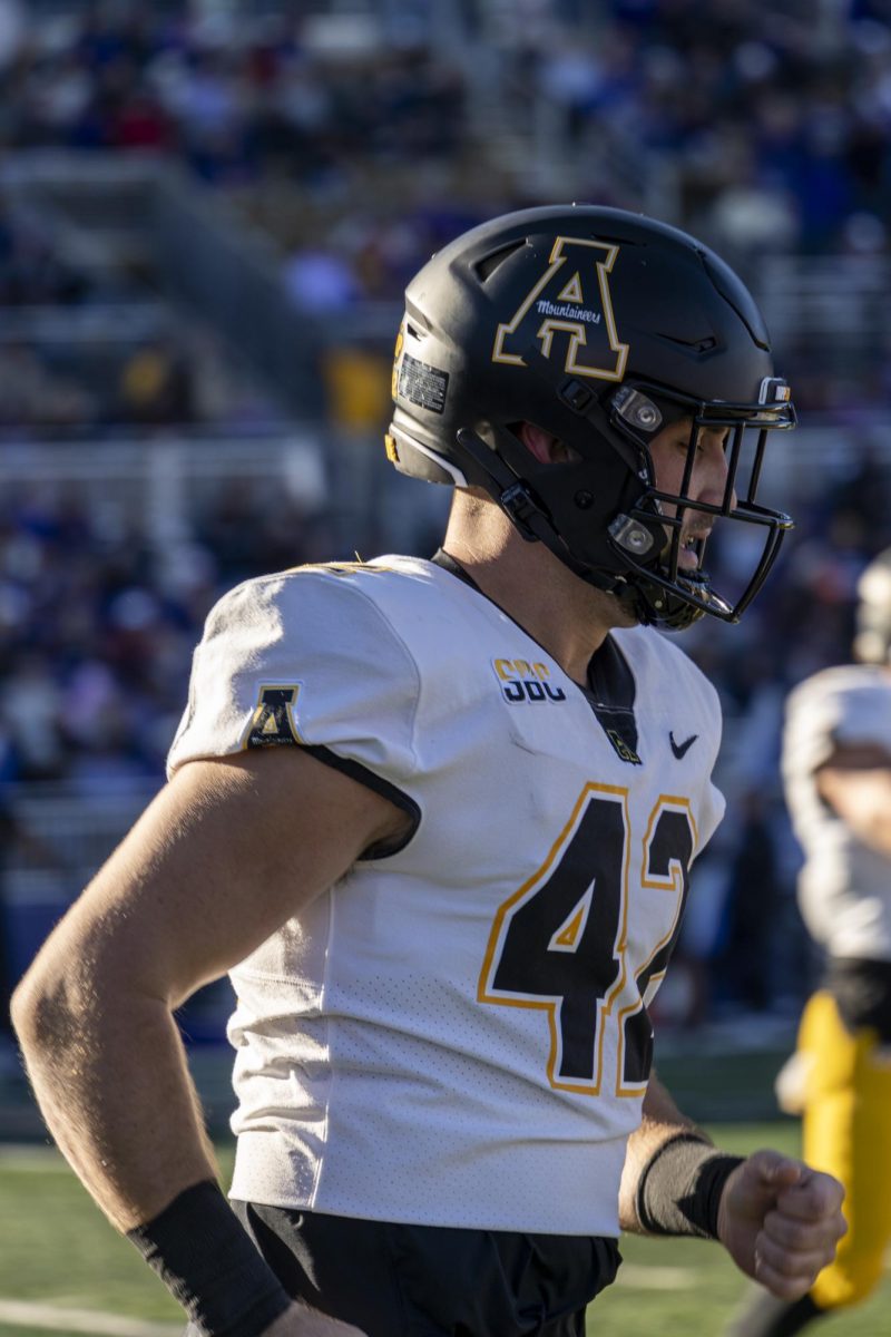 Christian Johnston crossing the field at JMU on Nov. 18, 2023. Spanning from 2019 to 2023 Johnston has been the primary long snapper for 54 games.