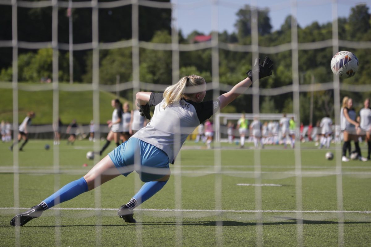 Redshirt freshman goalkeeper Sarah Wommack warming up before the game on Aug. 25. Before Wommack came to App State, she was the 2022 ULS Academy Cup Golden winner. 