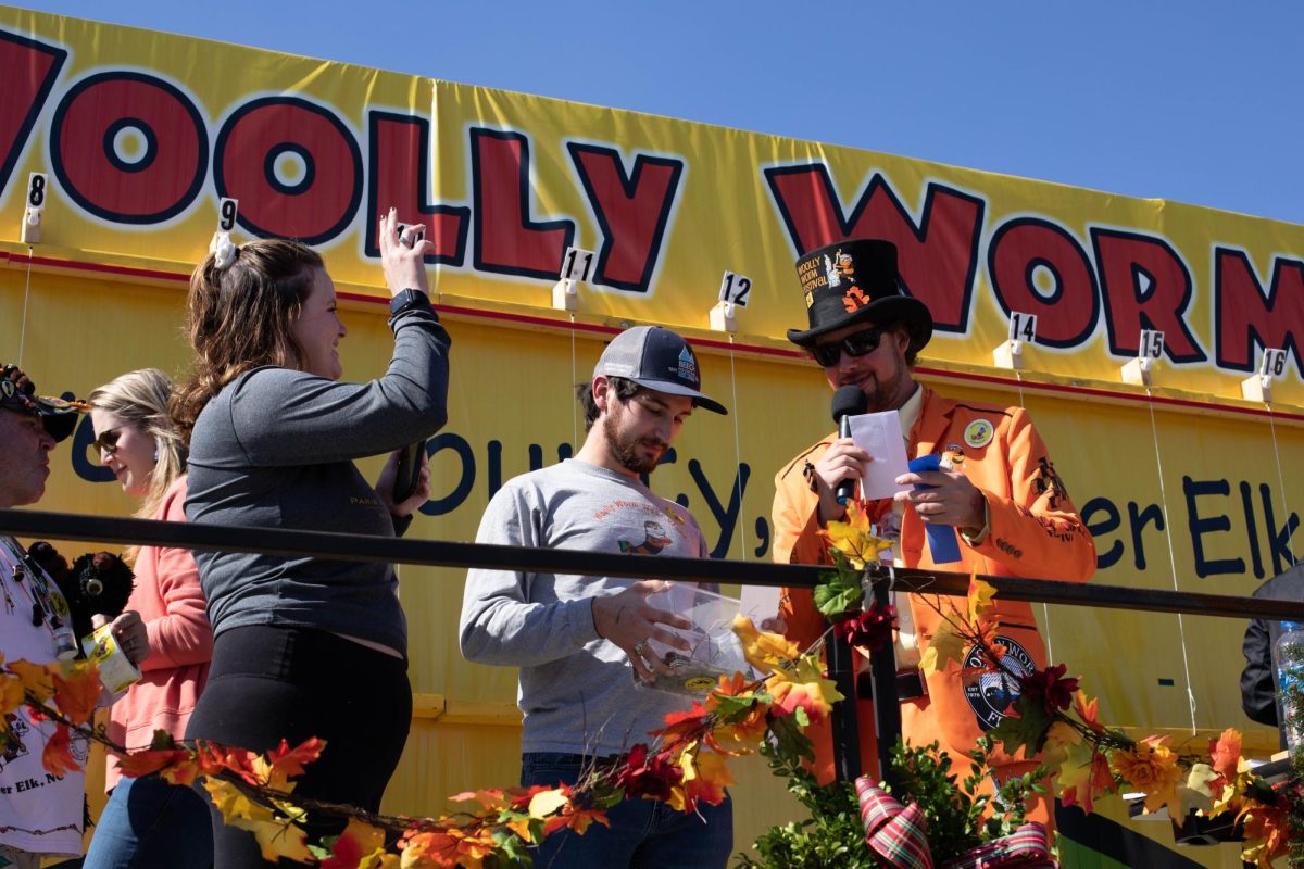 Participants gather at the Banner Elk Woolly Worm Festival to race their worms on Oct. 15, 2022. These woolly worms have been used since 1978 to help the town predict what the upcoming winter conditions would be like.