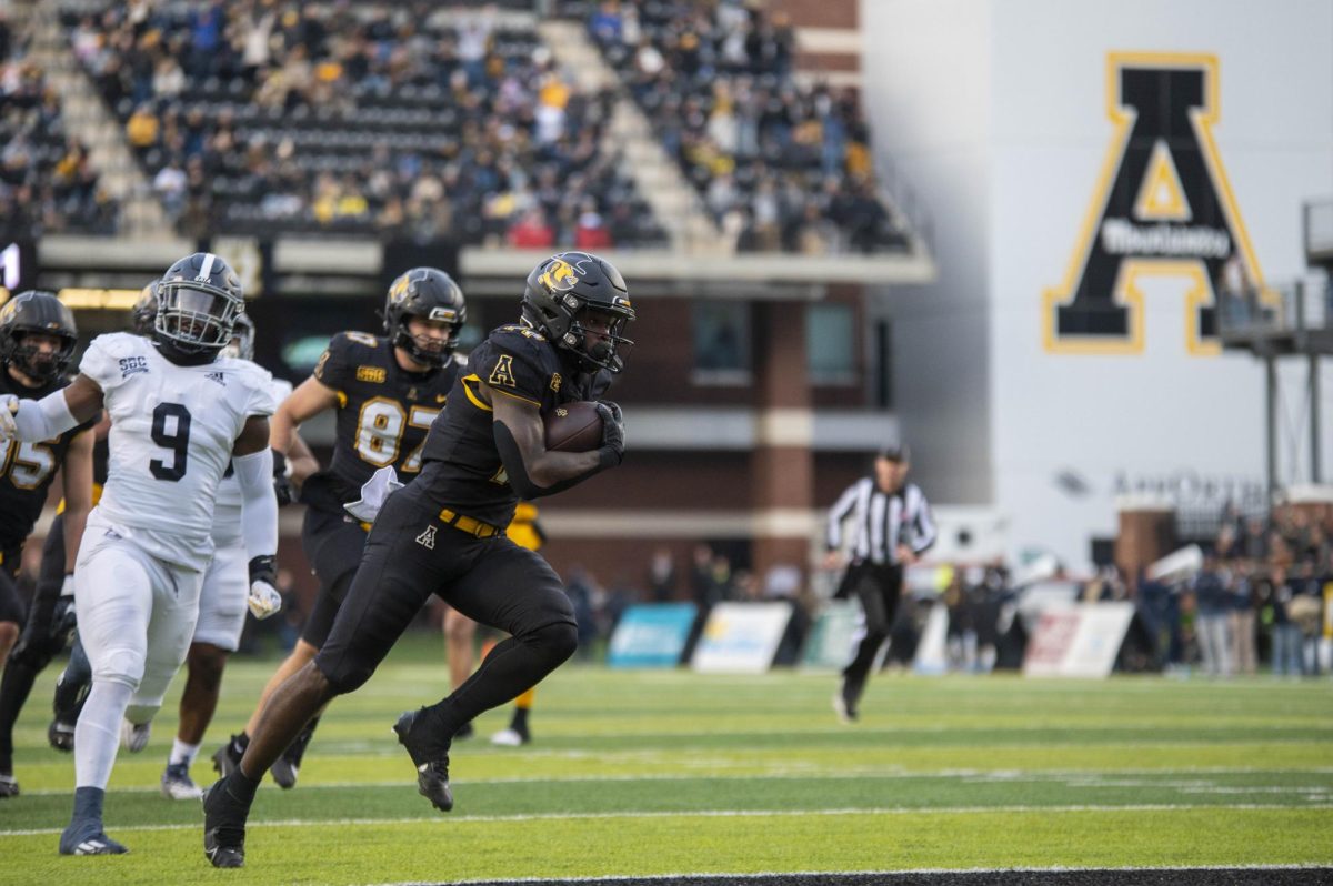 Redshirt sophomore Kanye Roberts rushing into the endzone against Georgia Southern on Nov. 25. Roberts had 14 carries for 109 yards along with 1 touchdown this game. 