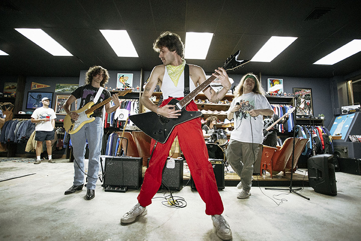 From left, band members Drew Collins, Evan Flaherty and Andy Locklear perform at Off The Rack Vintage on April 19. The band has gained attention as they have performed at a number of venues.