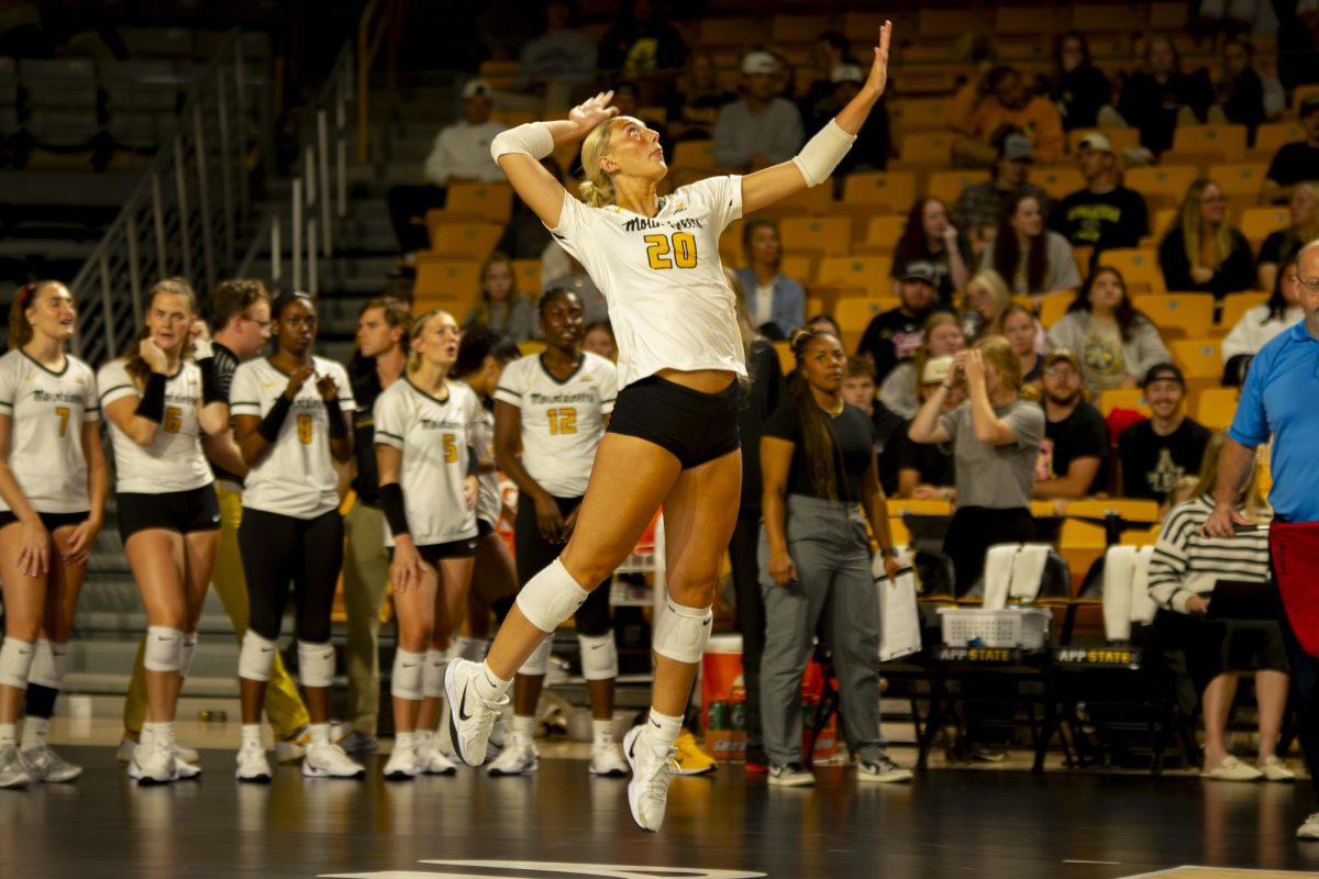 Freshmen outside hitter Maddie Smith goes up for a serve at the Holmes Convocation Center on Sept. 1