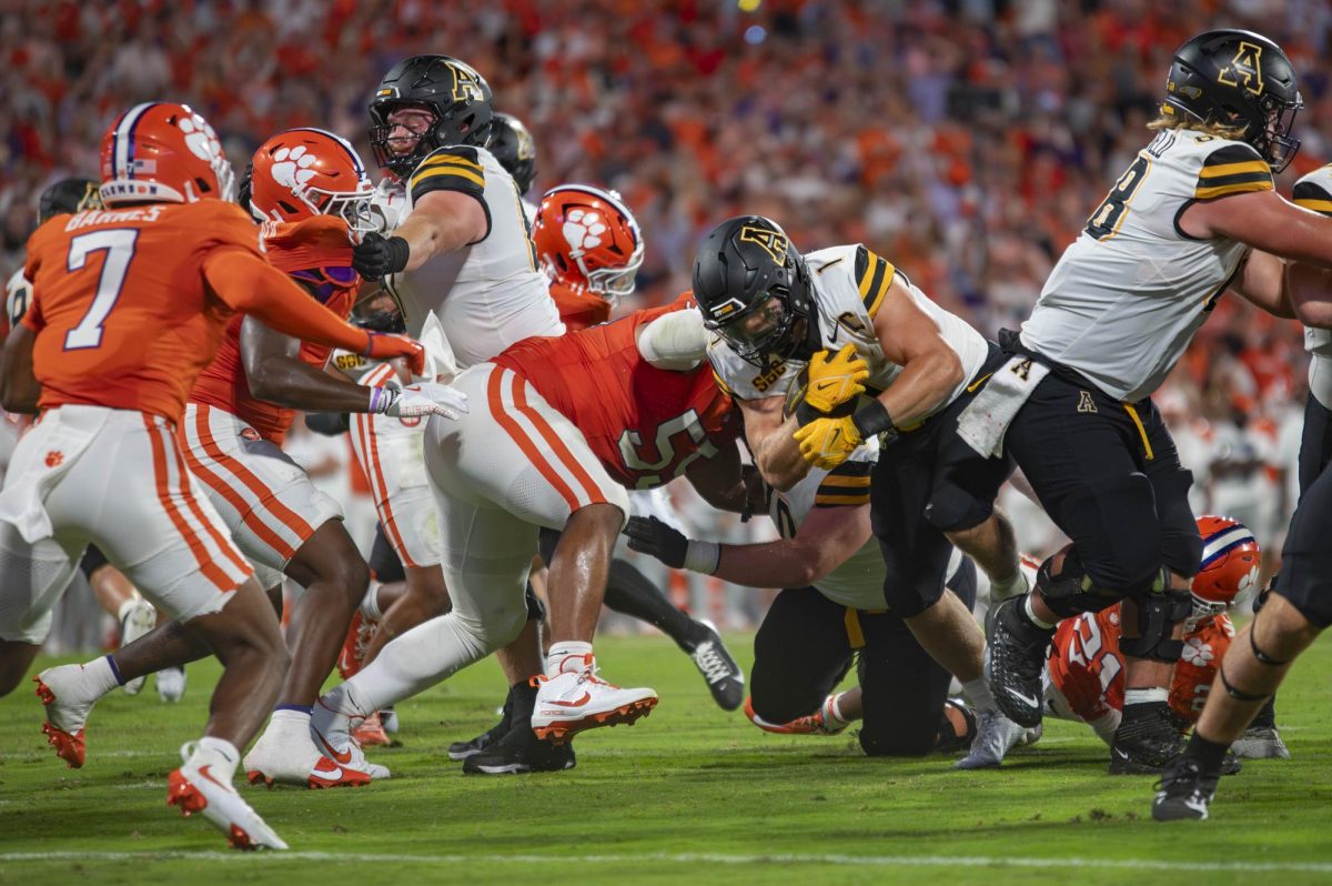 Running back Anderson Castle muscles his way through the Clemson defense on Sept. 7. Castle finished the game with 11.4 yards per 7 carries and 1 touchdown.