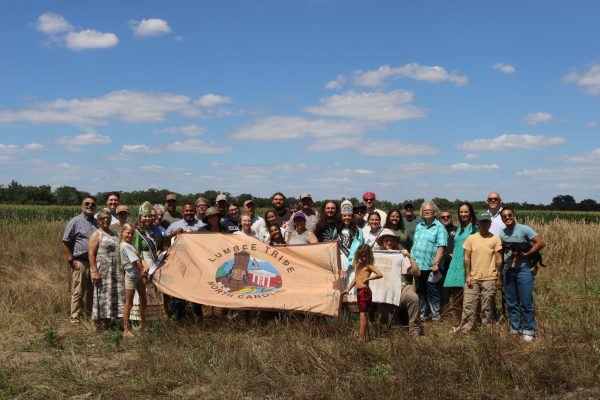 A group of App State students visit a dig site on the Lumbee River in June. Anthropology professor Seth Grooms leads the group through the exhibition while teaching them about respecting the native land. Courtesy of Seth Grooms