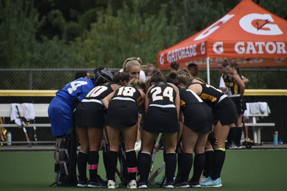 The App State field hockey team huddles before the App State vs. Towson game on Sept. 21. 