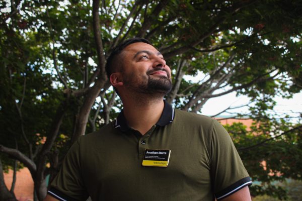 Jonathan Ibarra wears his name tag proudly outside Belk Library on Aug. 21. Ibarra is App State’s Latin Hispanic Alliance advisor.