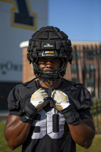 Nate Johnson poses in his practice
uniform at Kidd Brewer Stadium on Aug. 28. In 2023, Johnson appeared in all 14 games with 10 starts as an outside linebacker totaling 43 tackles, 7.5 sacks, 8.5 tackles for loss and one forced fumble.