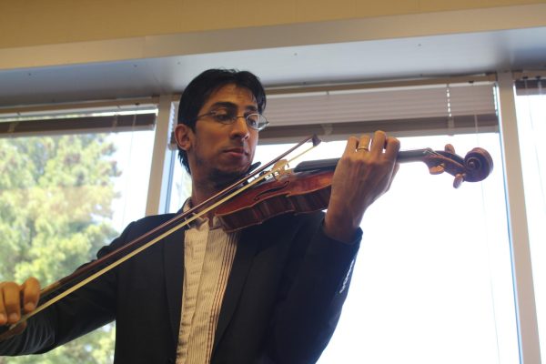 Assistant Professor Pedro Maia bows on his violin at the Broyhill Music Center on
Aug. 29. Maia has played in many different places worldwide and plans to share his experiences with students at App State.