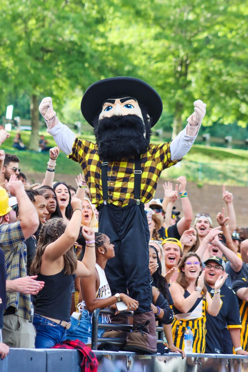 Yosef joins the crowd to cheer on the Mountaineers at Kidd Brewer Stadium on Sept. 2, 2023. Yosef has been a staple figure for the Student Yosef Club since it was founded 50 years ago to provide scholarships for App State student athletes.