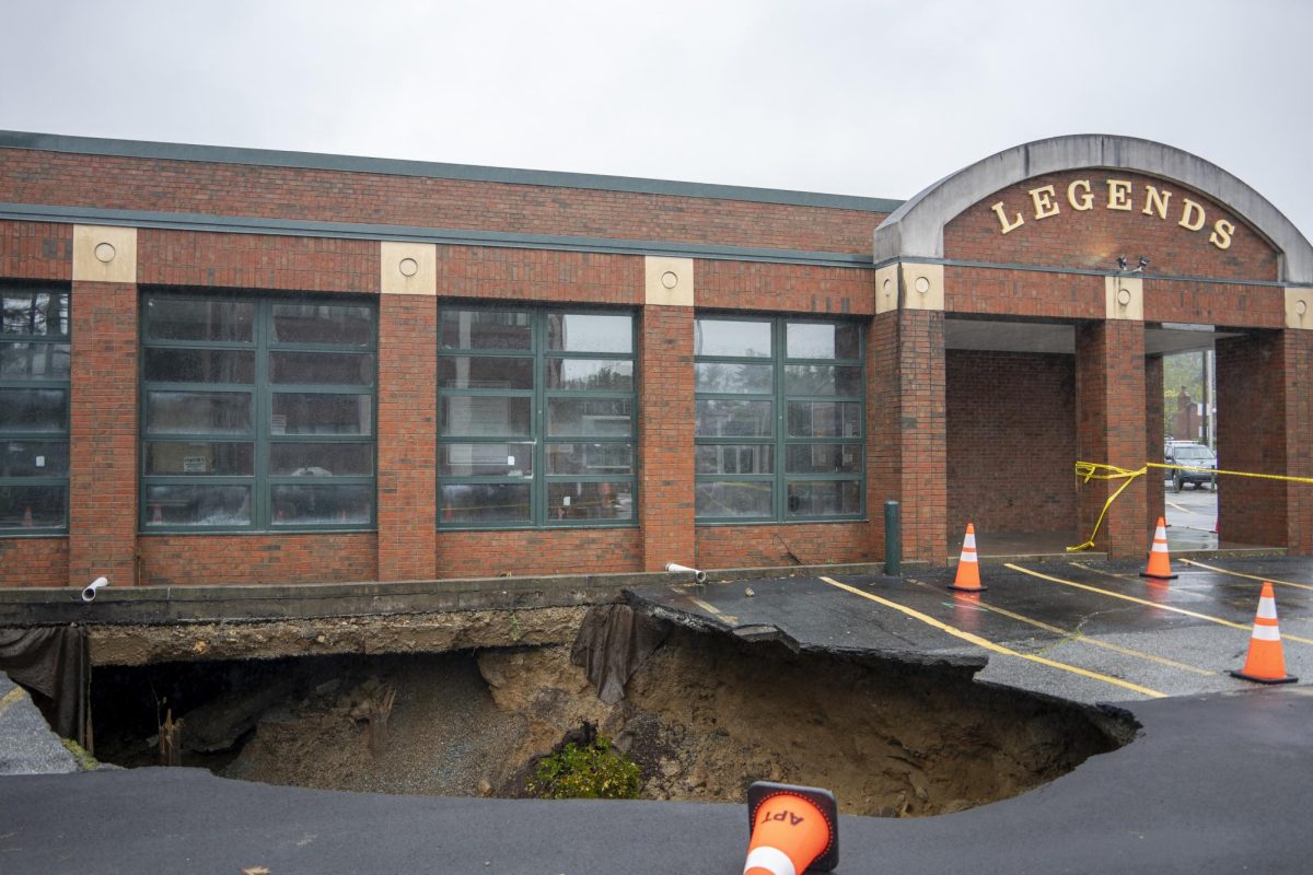 The Legends parking lot collapses into a sinkhole on Sept. 27 due to the effects of Hurricane Helene.