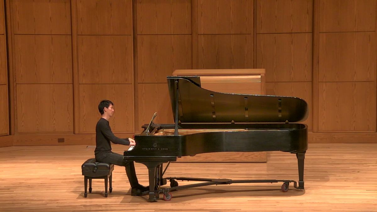 Pianist Thomas Feng performs at the Tui St. George Tucker Symposium at the Hayes School of Music on Sept. 16. Feng performed a piece called “Ave Verum Vol. 1-3,” an unfinished work by Tui’s. Courtesy of Nicholas Cline