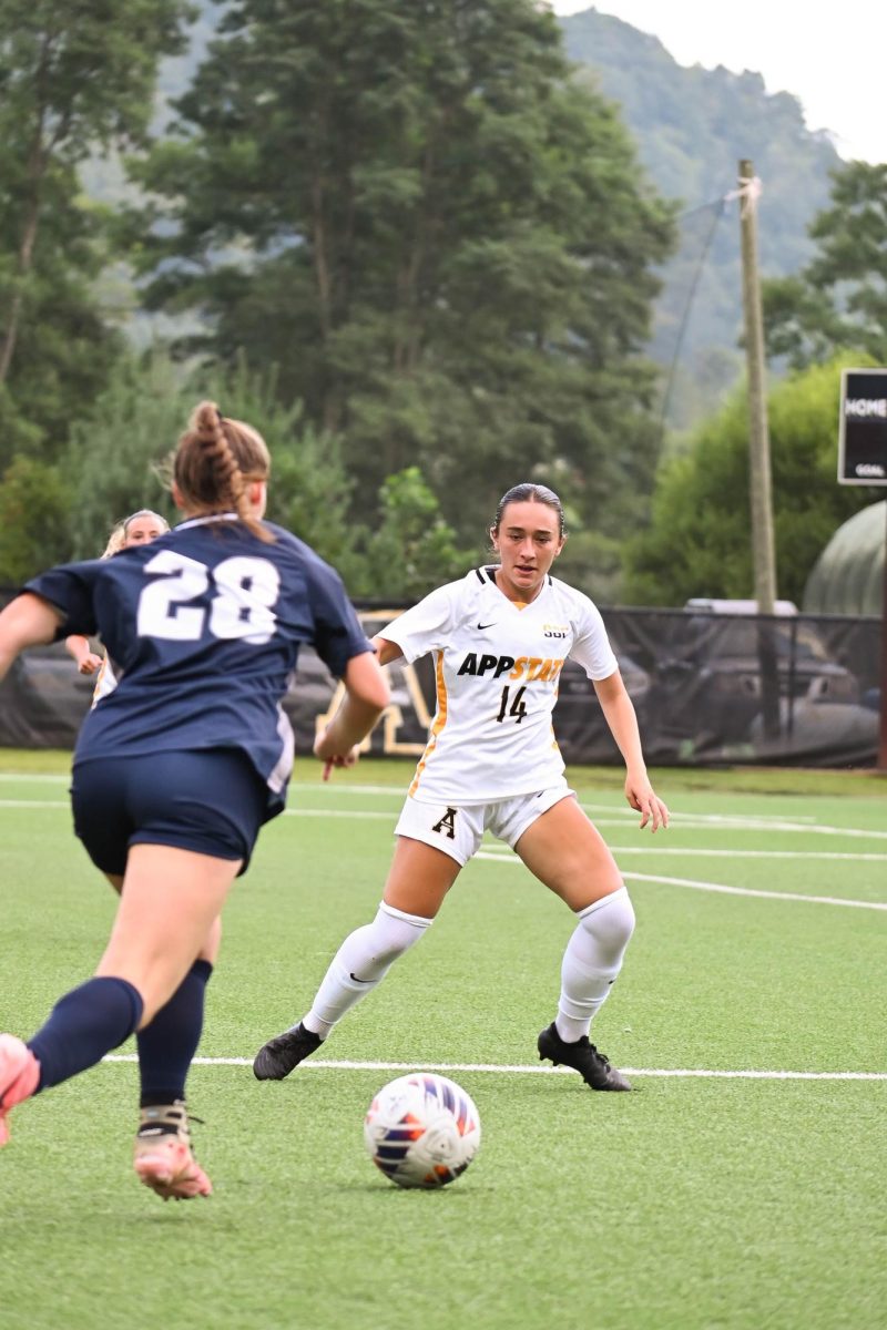 Junior defender Aleesia Ambrosio quickly moves to prevent Longwood from scoring at the App State vs. Longwood game on Aug. 29. App State was able to defeat Longwood with a 2-0 finish.