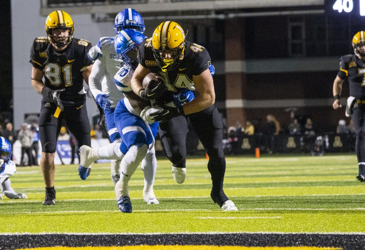 Running back Anderson Castle runs the ball toward the end zone at the App State vs. Georgia State game on Oct. 19, 2022.