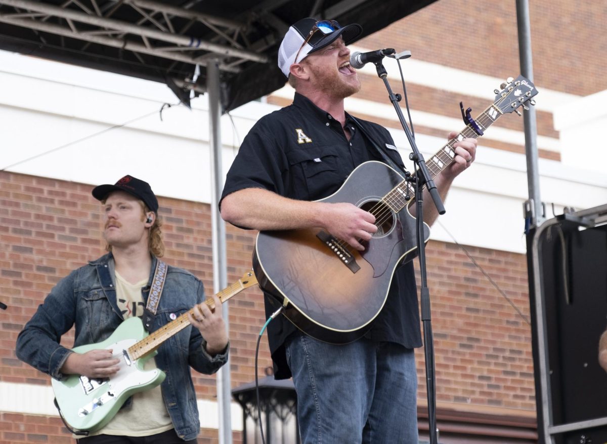 Adam Church performs for fans outside of Kidd Brewer Stadium on Sept. 3, 2022.