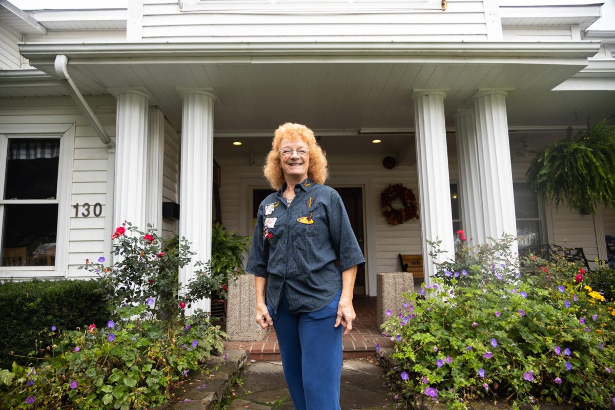 Employee Jenny Cole smiles in front of the Daniel Boone Inn on Sept. 25. She has been working at the restaurant for over 12 years.