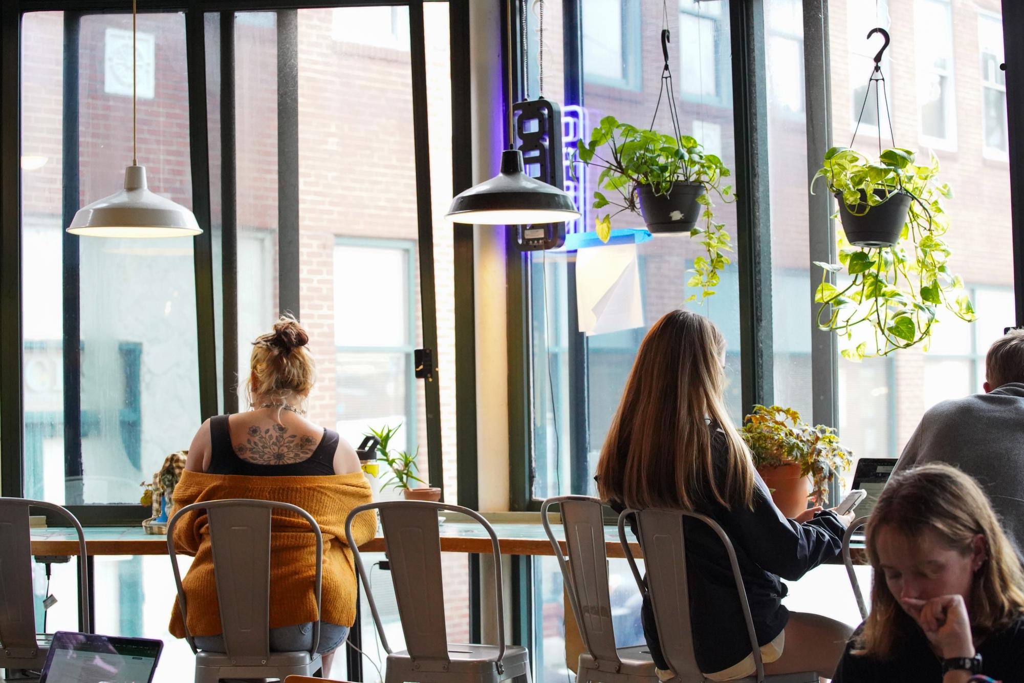 Customers sit inside of Espresso News on Sept. 5. Many students use Espresso News as a place to work on assignments and homework.