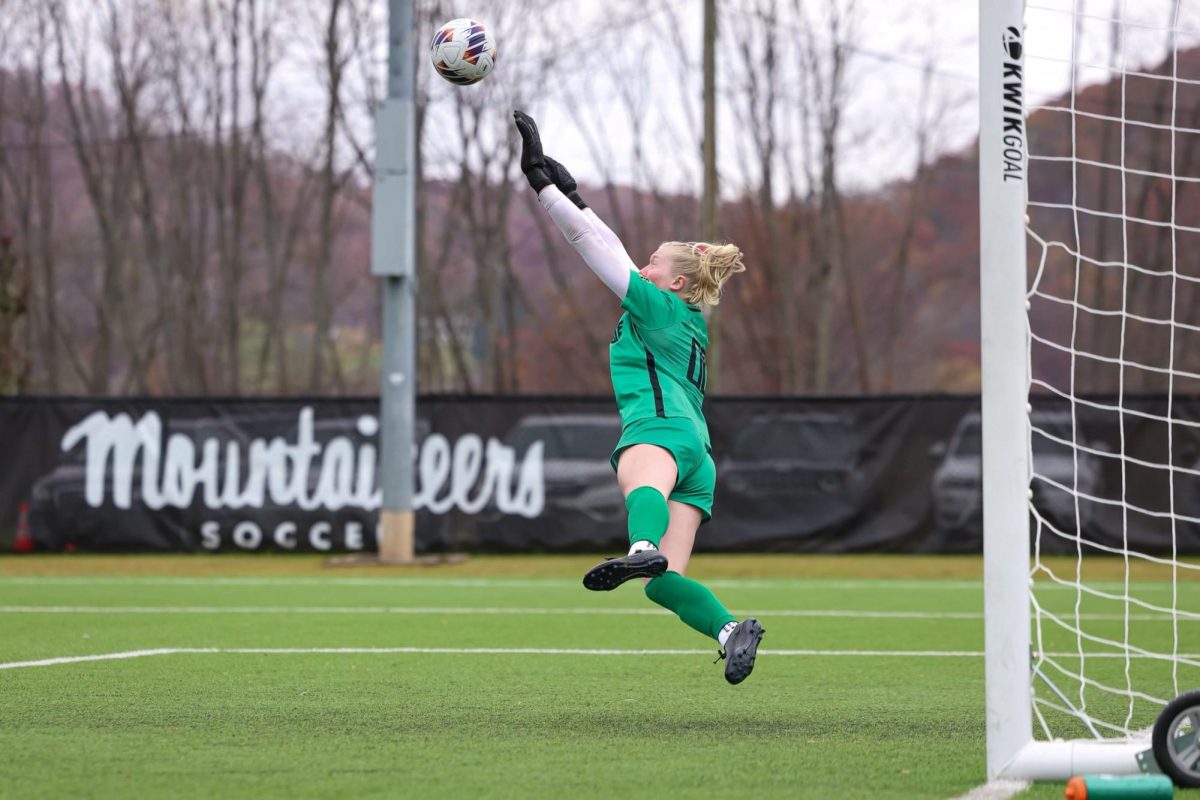 Goalie Sarah Wommack dives to block a goal during the App State vs. Texas State game on Oct. 27.