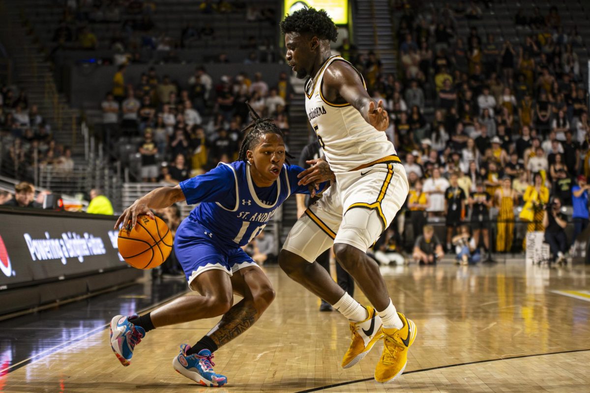 Freshman Jason Clarke Jr. guarding a St. Andrews player on Nov. 6. In high school, Clarke won a state championship at Miller School in Virginia, where he averaged 18 points a game.